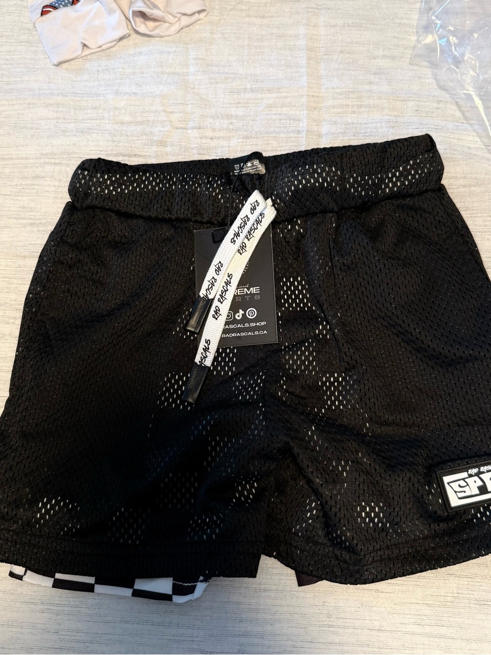 Kids Black Mesh Athletic Shorts with Checker Trim